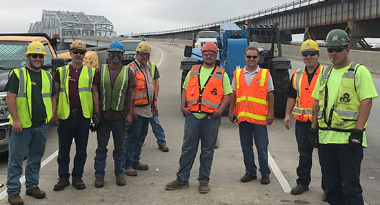 The Acme Crew at a job site.